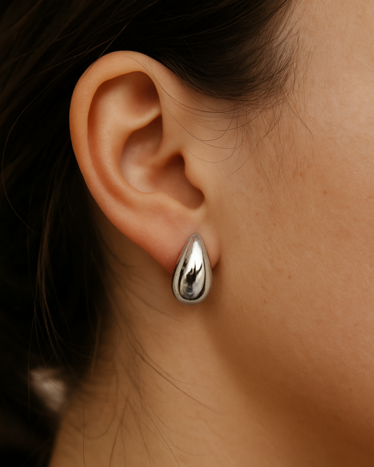 Aretes destello líquido