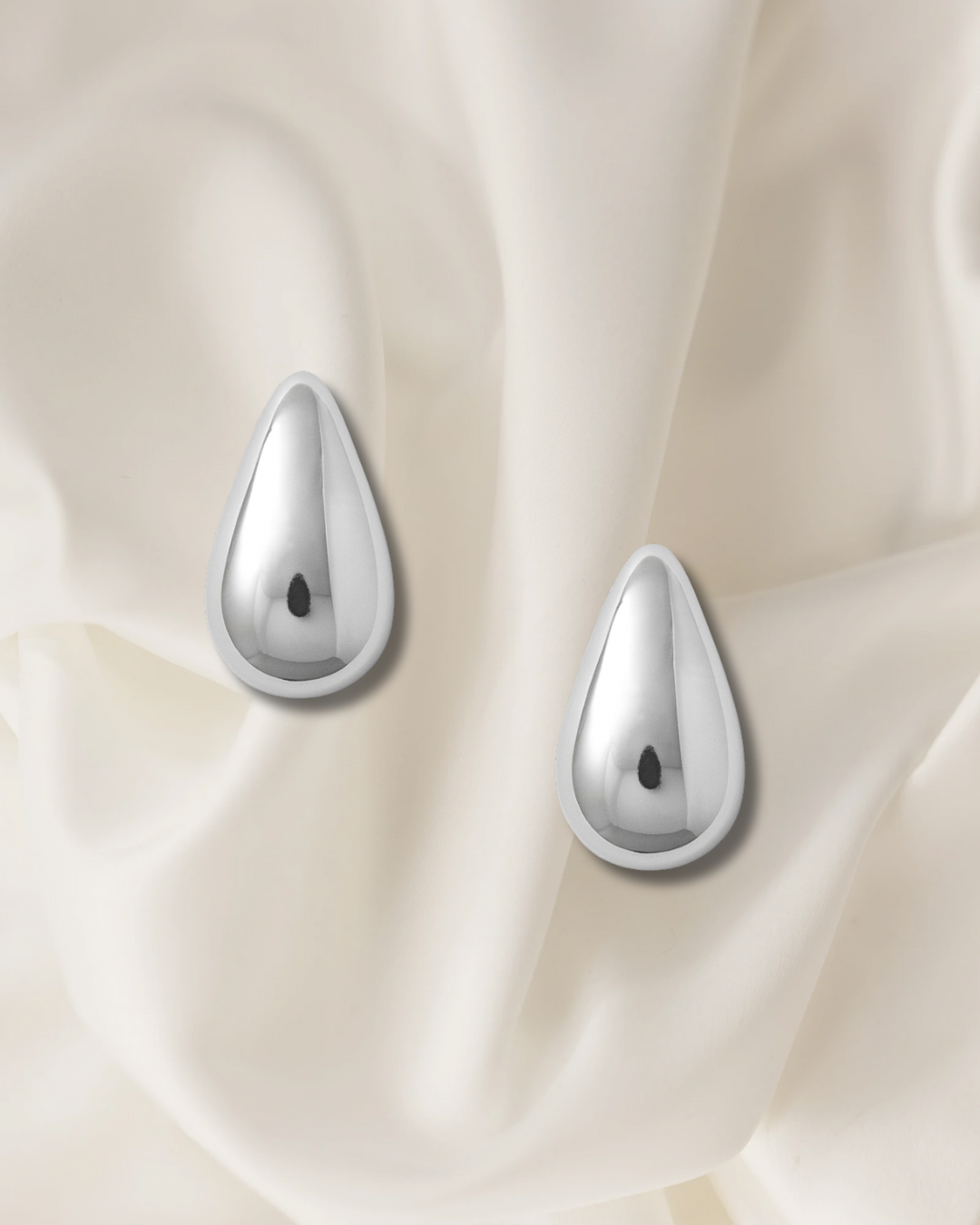 Aretes destello líquido