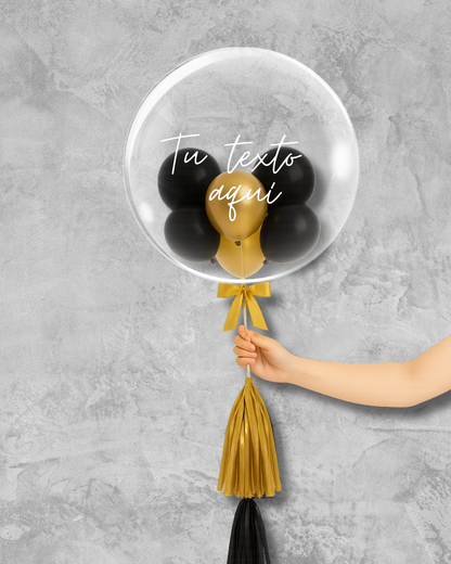 Globo burbuja con globos negros y dorados